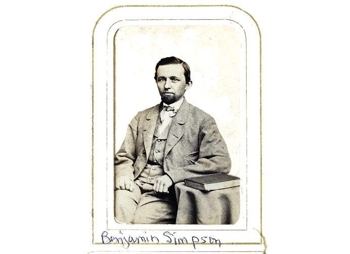 A man wearing a suit and tie is sitting in a chair. AI generated content
